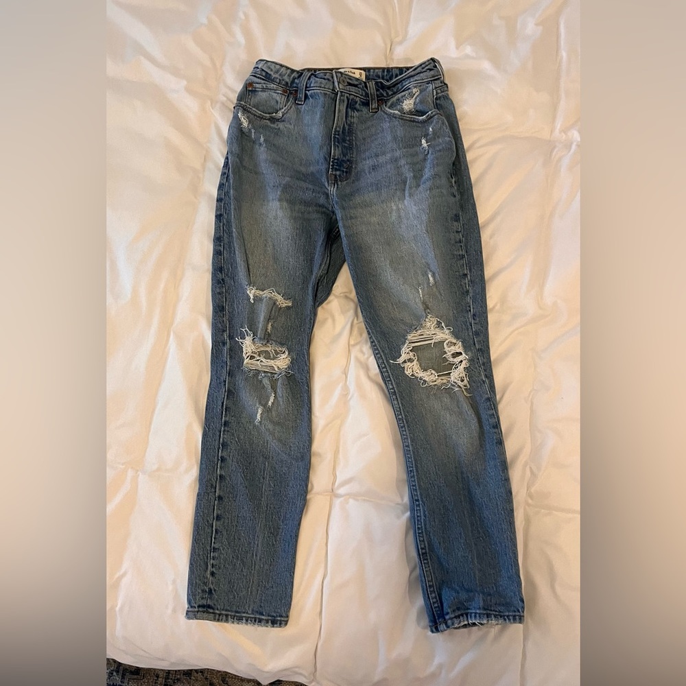 Denim blue distressed jeans size 27